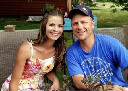 Sara and Scott sitting outside