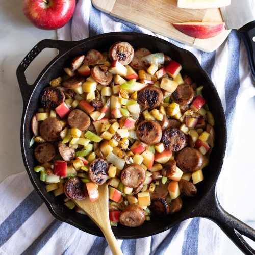 Apple sausage breakfast skillet in a cast iron pan